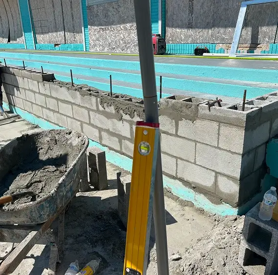 Building a concrete retaining wall on residential property