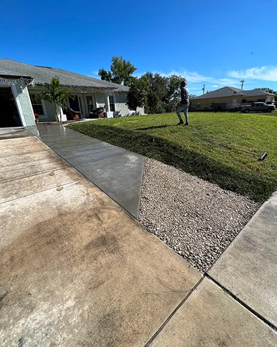 Concrete driveway installation with smooth finish