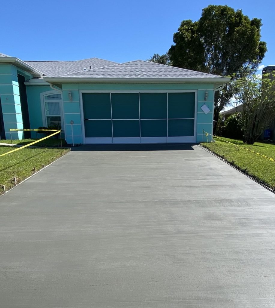 Concrete driveway installation with smooth finish