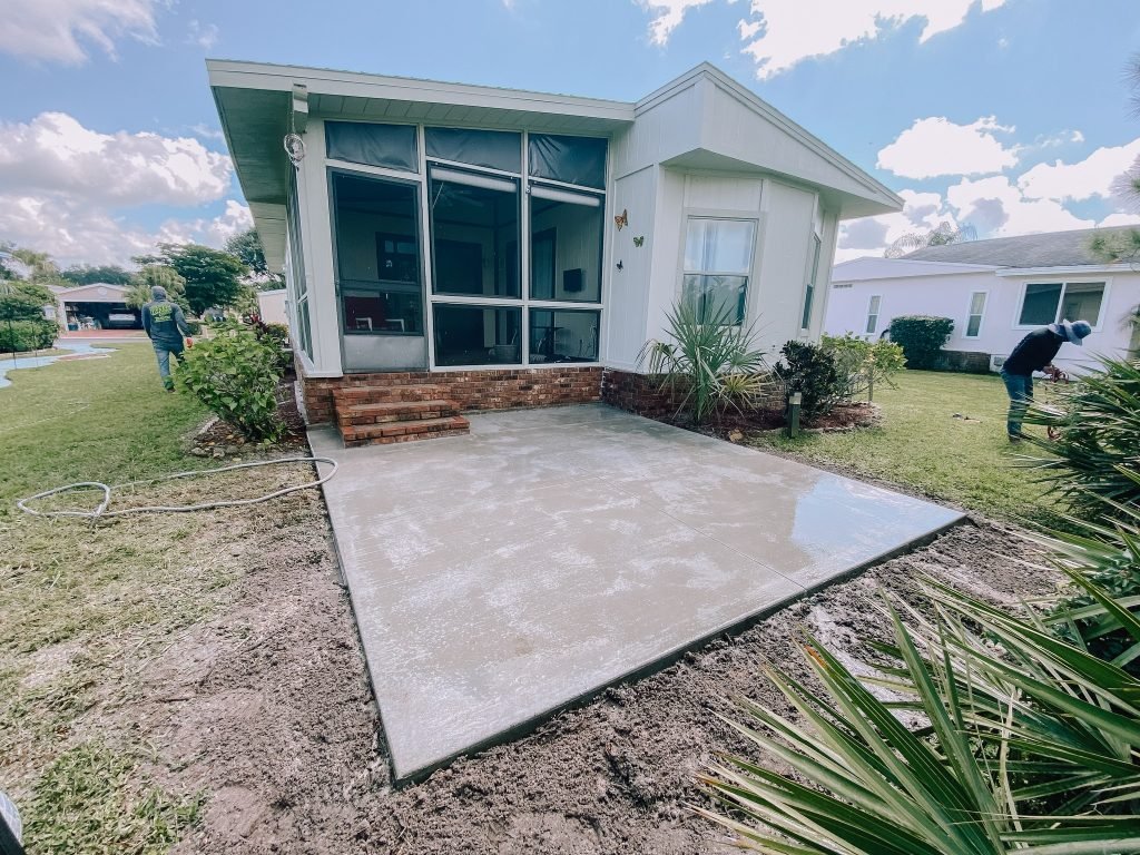 Concrete patio slab for a mobile home