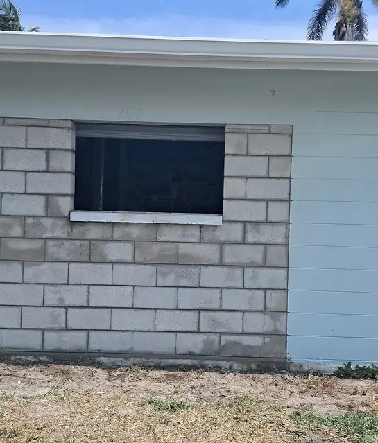 Concrete retaining wall adding value and preventing erosion